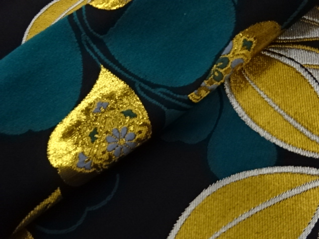  葉に華文模様織出し袋帯